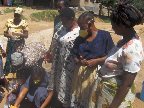 Hurumia Watoto Group Organization Tanzania-helping-widows aids mixing colours